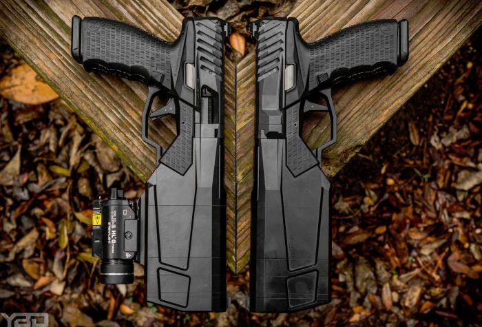 Two Silencerco MAXIM9 integrally suppressed handguns.