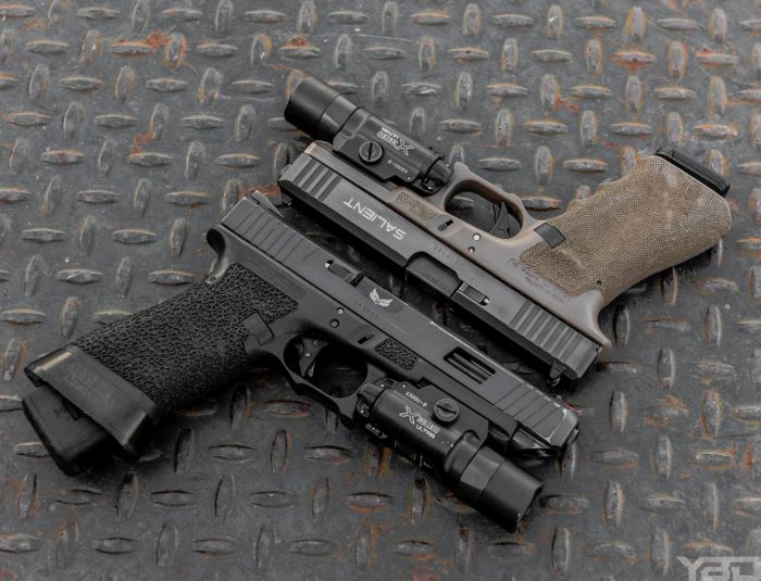 A custom Glock 34 Gen 3 and a Salient Arms Glock 17 Gen 3.