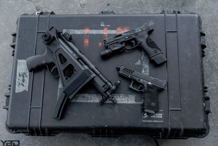 A trio of 9MM pistols.  A Zenith Firearms Z-5P with a SB Tactical Brace, a custom S&W M&P9, and a Grey Ghost Precision Glock 19 Gen 4.