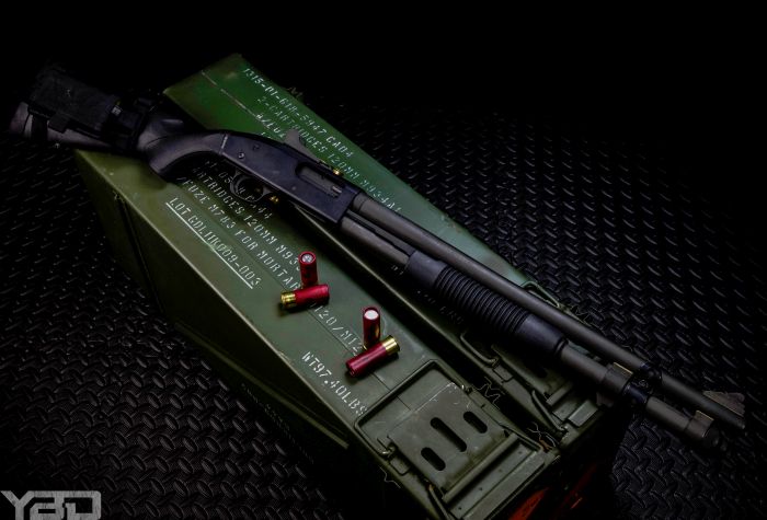 A Mossberg 590 12 gauge shotgun providing the user with an ideal home defense firearm.
