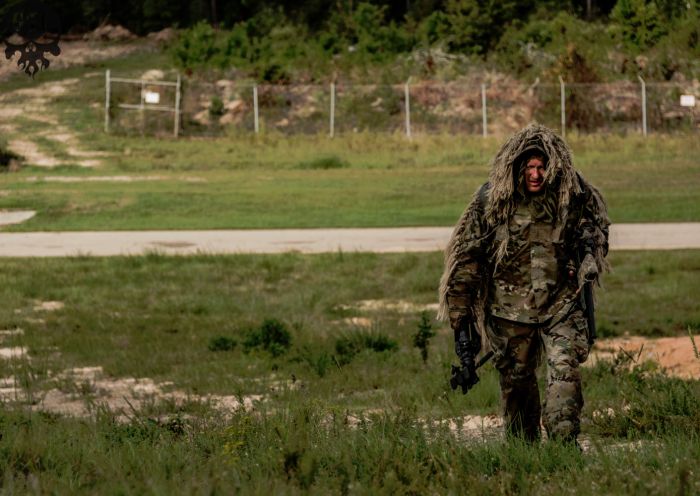 A sniper student walking back after successfully completing his final stalk.