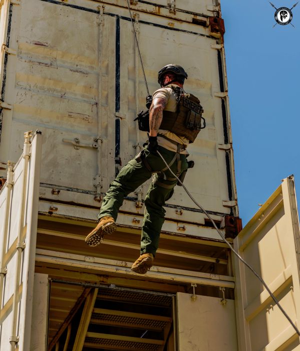 Students rappelling from our Rappel & Fast Rope Tower during our TYPE I Advanced SWAT Course.