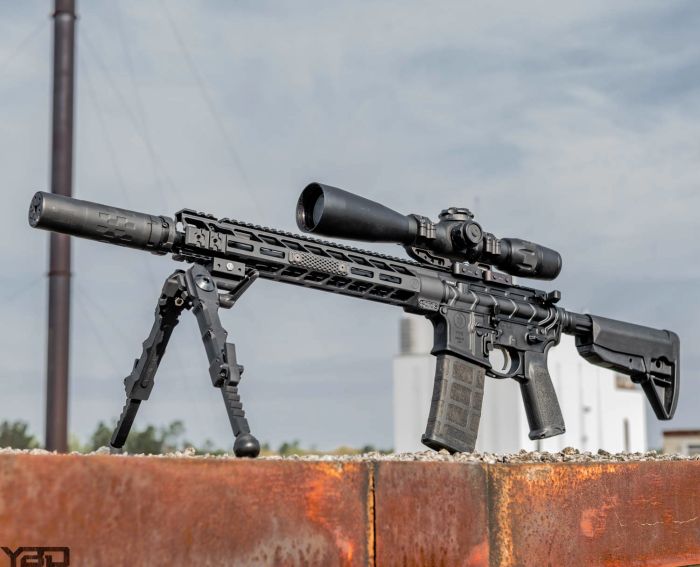 GTI's PWS MK114 MOD 2 rifle with SilencerCo suppressor, US Optics scope with a ZRO Delta scope mount, and a Gen 2 Accu-Tac bipod.