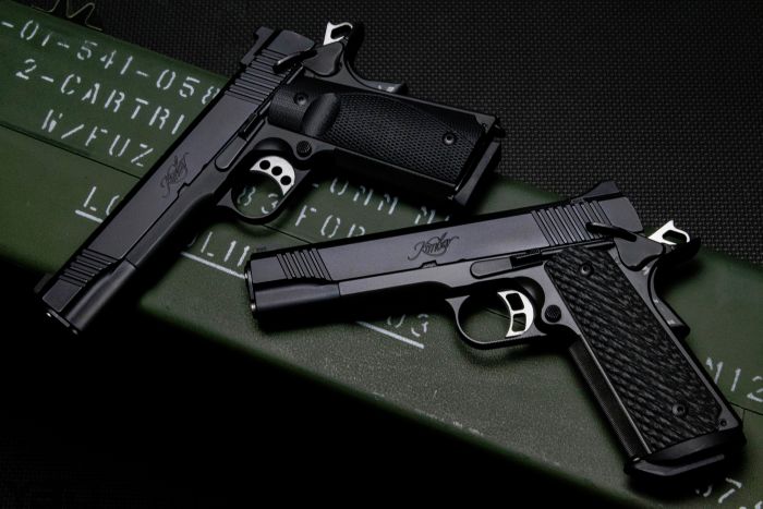 A couple of Kimber 1911s.