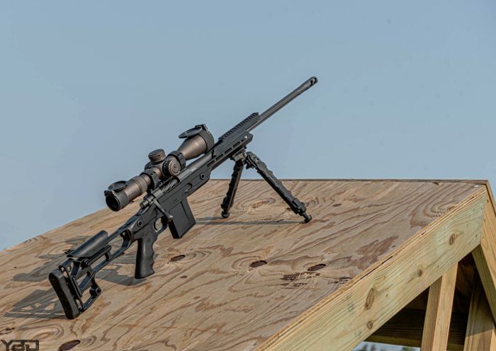 The Rainier Arms Precision Rifle stretching its legs on one of the obstacles on our sniper range.