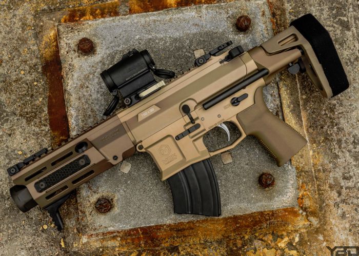 The Maxim Defense PDX is one nasty little firearm.  With an overall length of 18.75in it can be easily concealed in a backpack.  This specific one is chambered in 7.62x39 but do offer them in 556 as well.  Maxim equipped their PDX line with their HATEBRAKE which minimizes recoil, decreases muzzle flash, pushes gases and the concussion wave downrange away from the user.  It's truly a unique design.