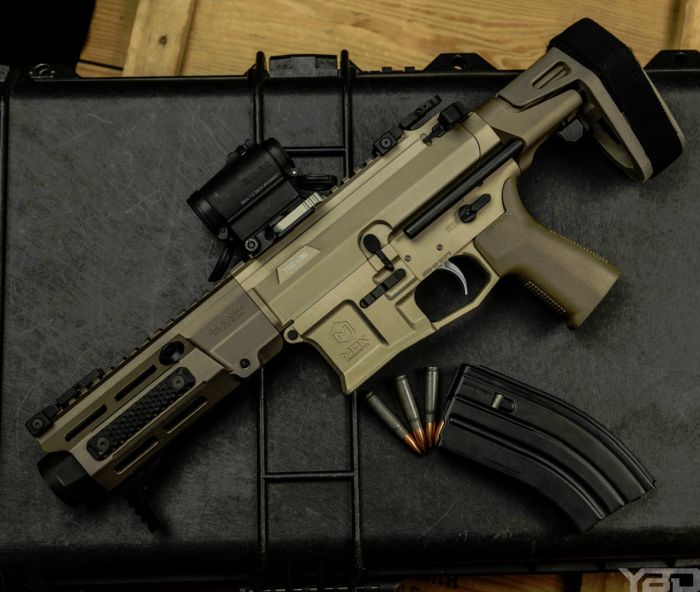 The Maxim Defense PDX is one nasty little firearm.  With an overall length of 18.75in it can be easily concealed in a backpack.  This specific one is chambered in 7.62x39 but do offer them in 556 as well.  Maxim equipped their PDX line with their HATEBRAKE which minimizes recoil, decreases muzzle flash, pushes gases and the concussion wave downrange away from the user.  It's truly a unique design.