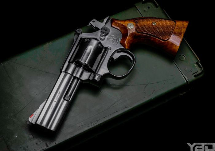 There is just so much beauty in a nice revolver with wood grain grips.  Just like this S&W 686.