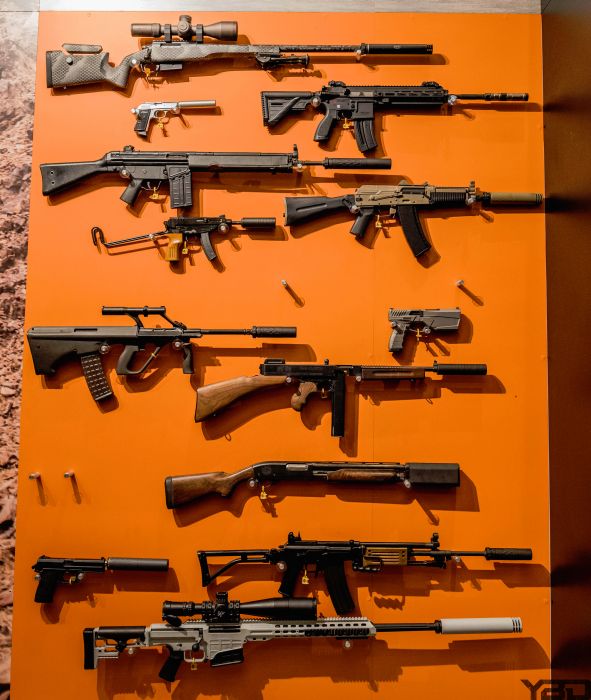 A whole bunched of suppressed firearms over at the SilencerCo booth. FIGHT THE NOISE!